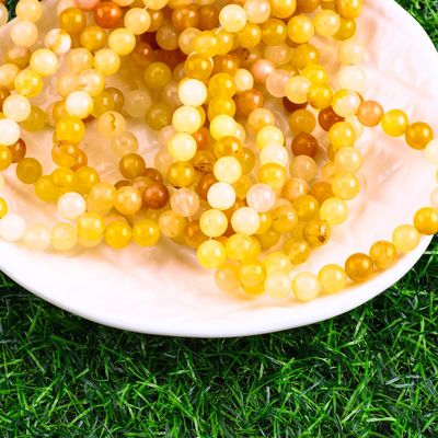 गहरे पीले नीलम गोल मोती प्राकृतिक क्रिस्टल रत्न विभिन्न मोती आकार DIY आभूषण बनाने के लिए ढीले मोती स्ट्रैंड्स