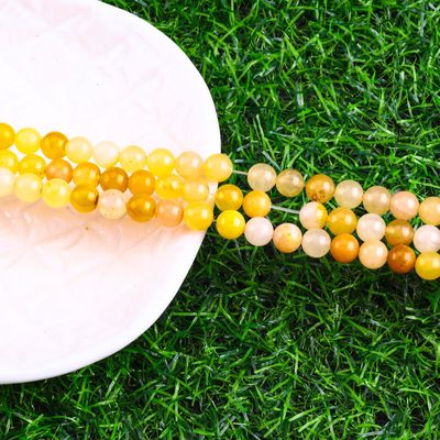 गहरे पीले नीलम गोल मोती प्राकृतिक क्रिस्टल रत्न विभिन्न मोती आकार DIY आभूषण बनाने के लिए ढीले मोती स्ट्रैंड्स